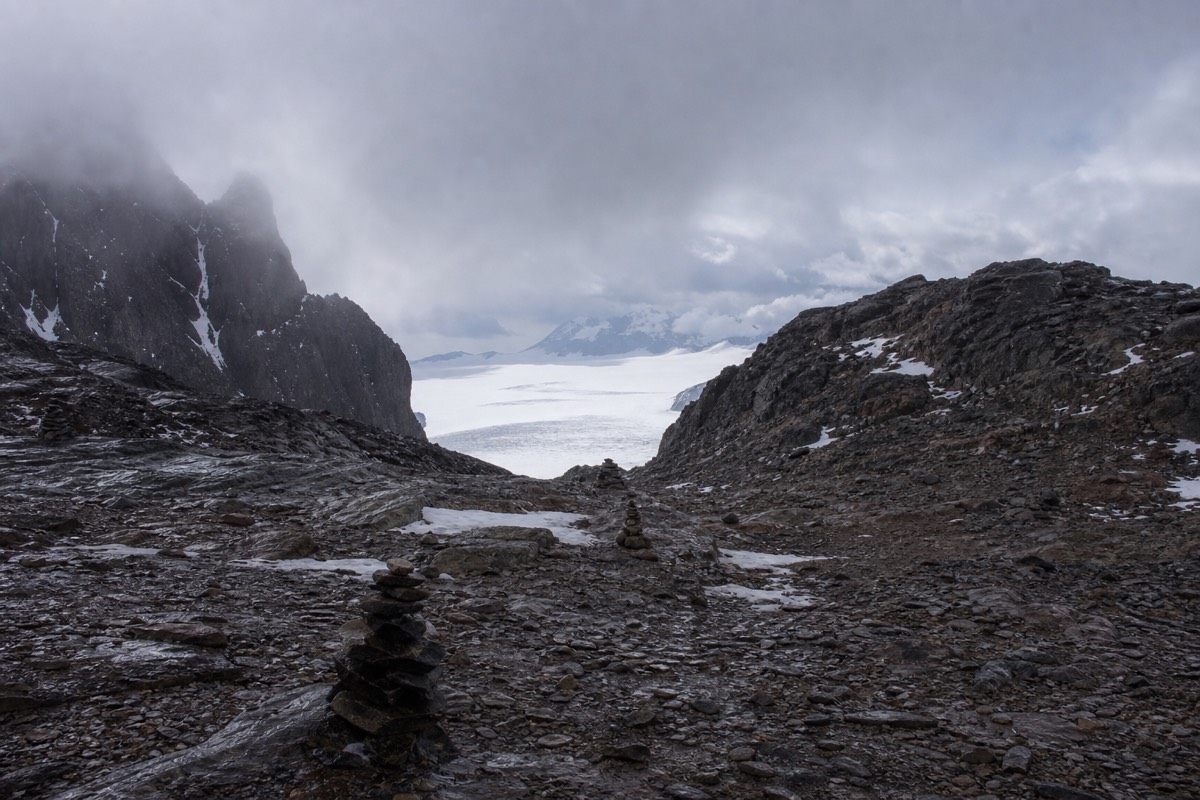 Snow lying on the high exposed ground of the John Gardner Pass above Grey Glacier
